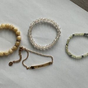 Set of 4 cream/gold bracelets
